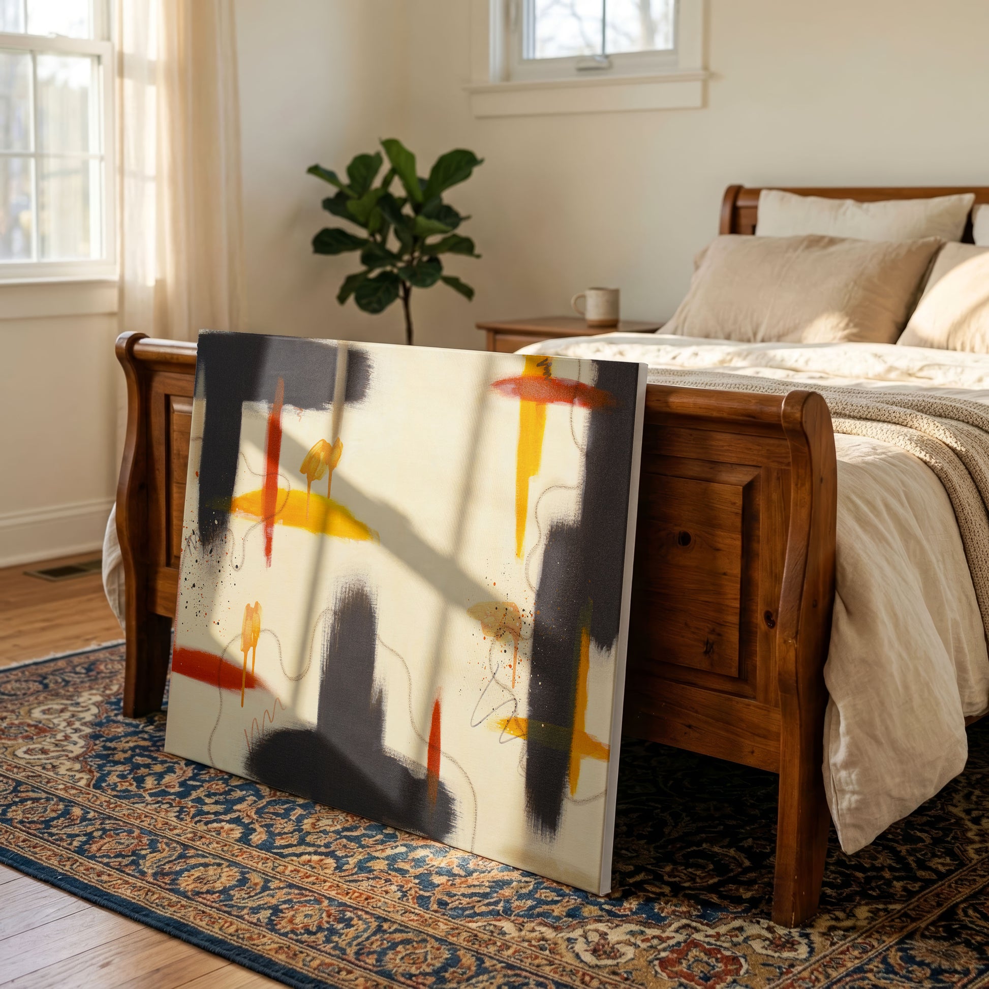 A canvas print of the painting staged in a minimalist bedroom. The canvas sits on a patterned blue rug, leaning against a wooden bedframe. There are tan and white sheets and blankets on the bed with a potted tree in the background.