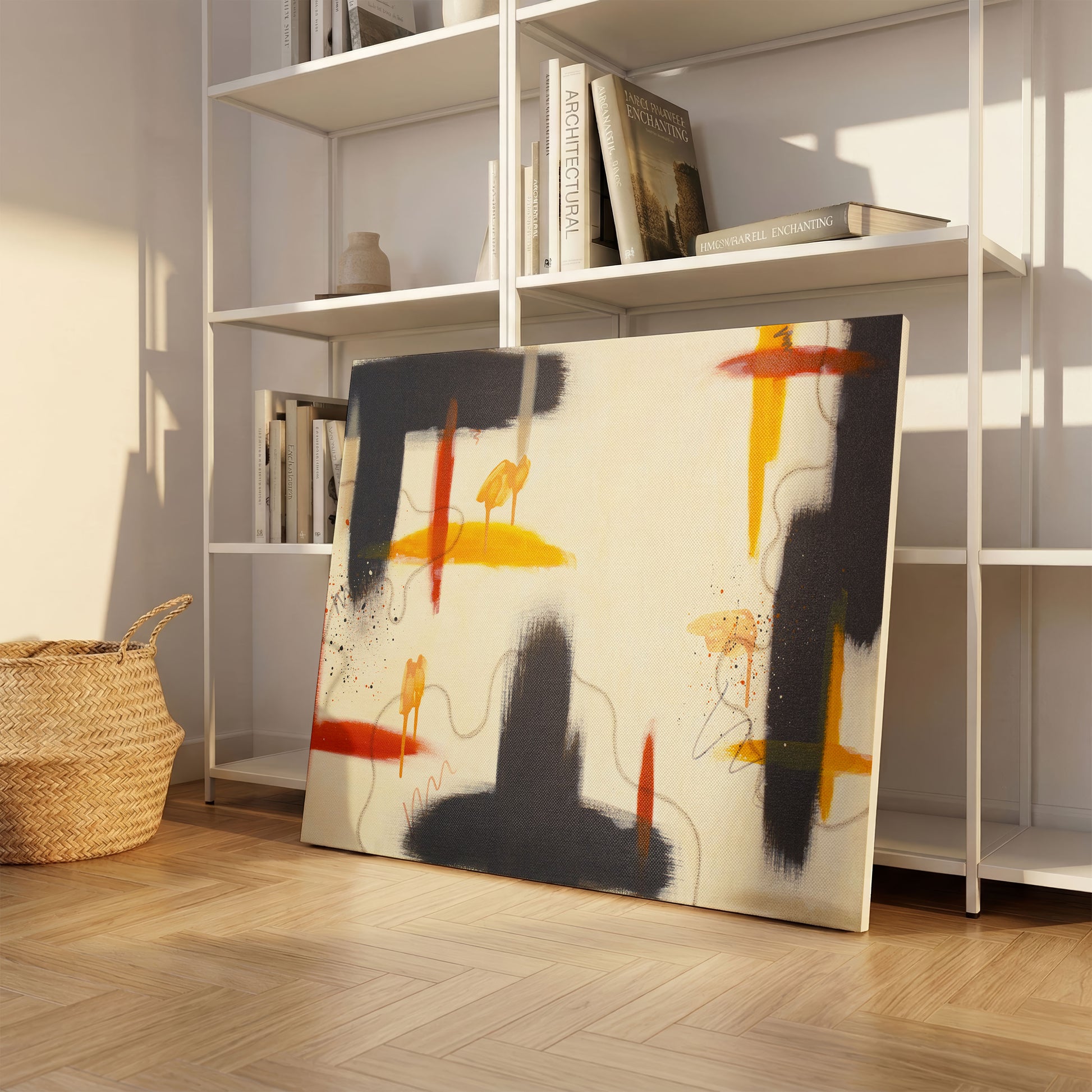 A canvas print of the painting leaning against a simple white shelve, sitting on a light wooden floor. There are books on several of the shelves, and a clay pot decoration. On the left is a oven basket.