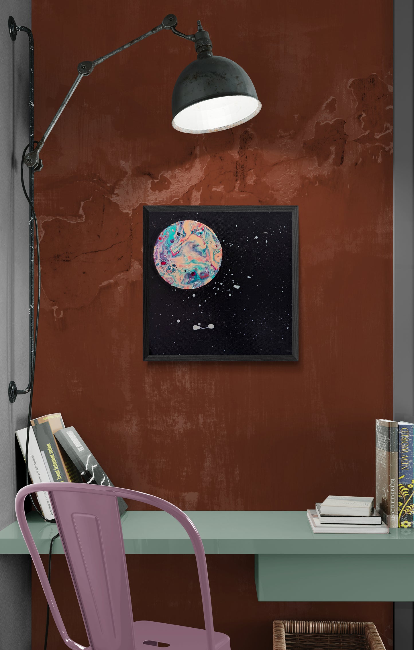 Strawberry Moon canvas displayed above a seafoam green desk with reading lamp and vintage decor on a rustic orange wall.