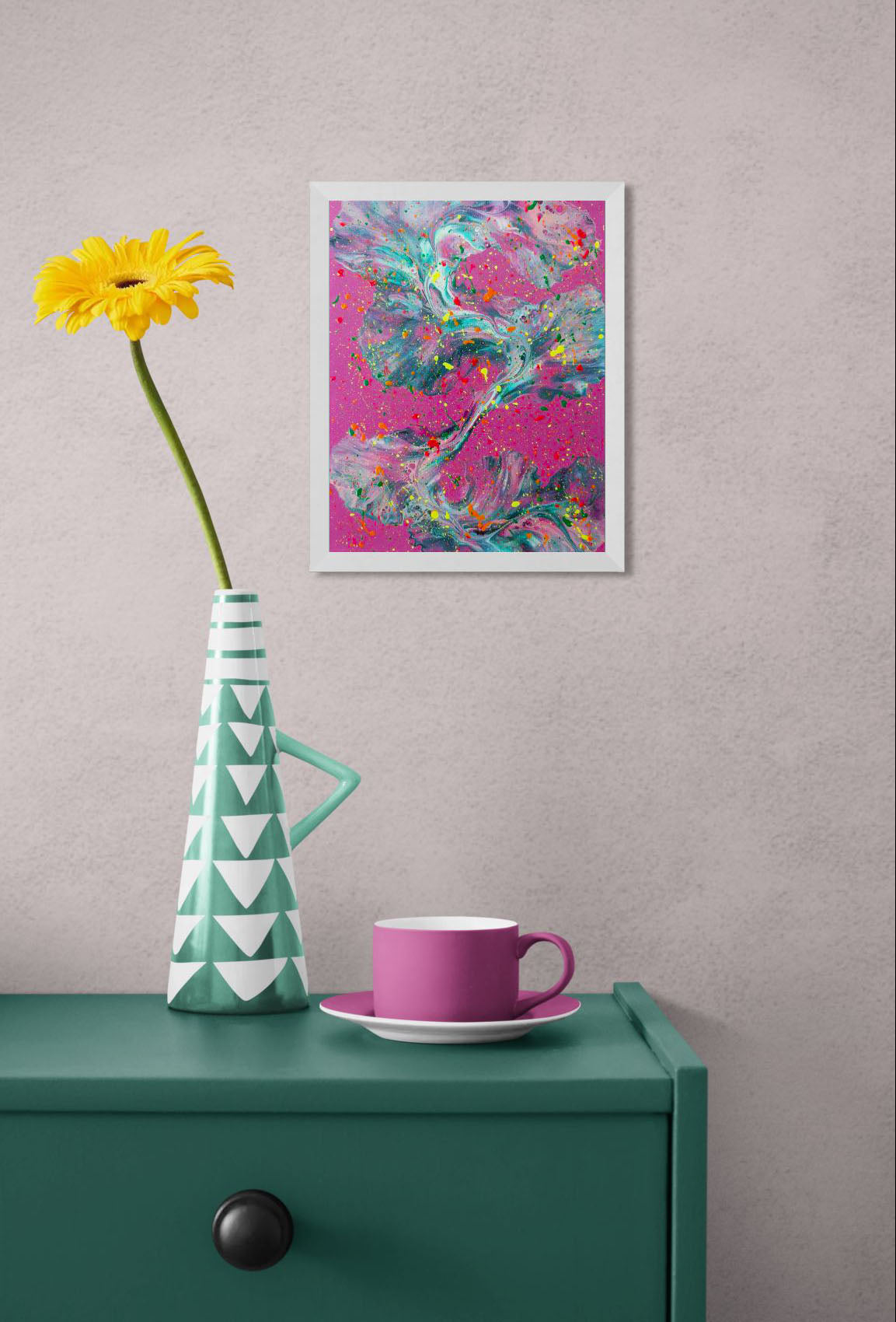 That’s a Bold Choice' painting displayed in a white frame on a textured wall above a green console table, styled with a yellow flower in a teal and white geometric vase and a magenta teacup.