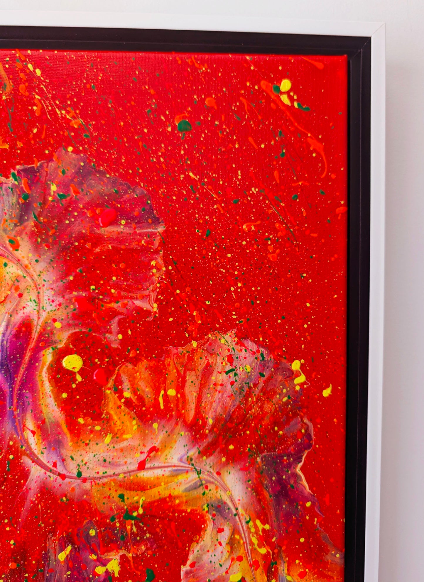 Zoomed-in view of the upper right corner of the painting highlighting delicate fluid lines and color blending in orange, red, and green tones.