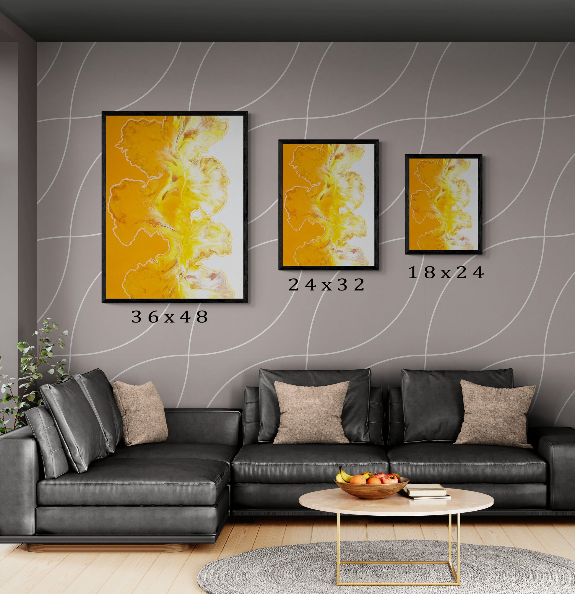 Abstract fluid art prints in black frames displayed in three sizes—36x48, 24x32, and 18x24—above a dark gray sofa with neutral pillows and a modern coffee table.